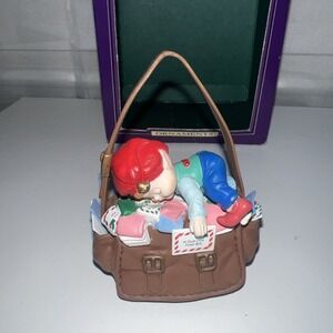 1992 Holiday Time Collectables Ornament Baby On Bag Christmas Ornament